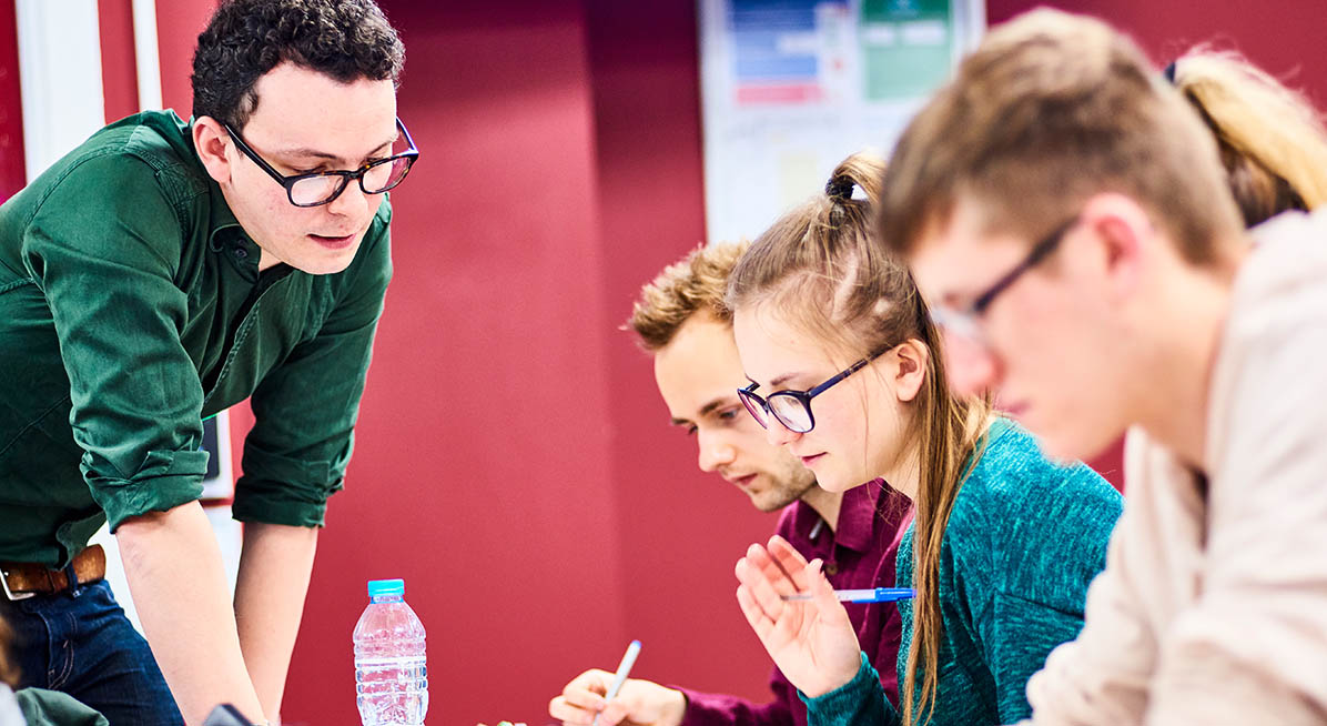 Students listening to a lecturer during a seminar